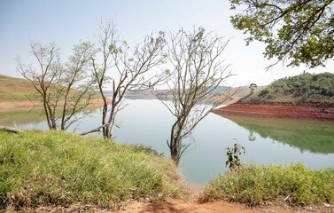 View of the dam in low water level water crisis.
