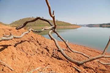 View of the dam in low water level water crisis.
