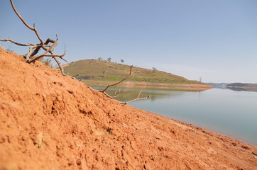 View of the dam in low water level water crisis.
