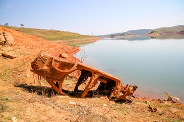 View of the dam in low water level water crisis.
