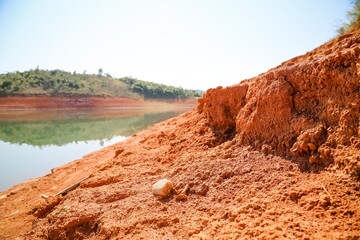 View of the dam in low water level water crisis.
