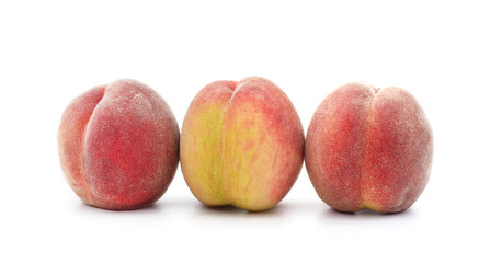 Three ripe peaches.