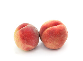 Two ripe peaches.