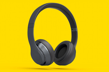 Gaming headphones and concept of music equipment isolated on yellow background.