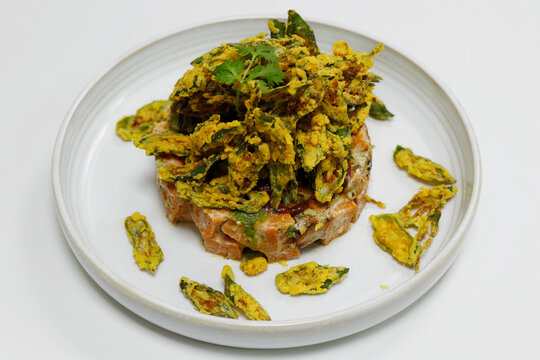 roasted sweet potato and crispy fried ladies finger indian style salad, street chaat food