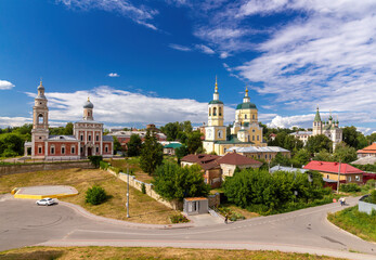 Fototapeta na wymiar View from the hill of the Serpukhov KremlinChurch of the Assumption of the Blessed Virgin Mary, Church of Elijah the Prophet, Church of the Life-Giving Trinity in Serpukhov, Serpukhov, Russia