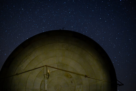 Giant parables of a former nato base with milky way in the background