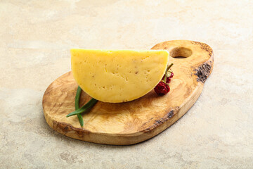 Hard cheese brick with walnut