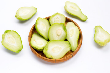 Fresh chayote fruit on white background.