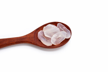 Toddy palm slices in wooden spoon on white background.