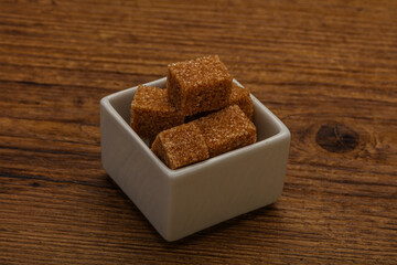 Cane sugar cubs in the bowl