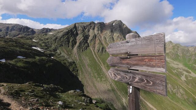 Direction signs at Timmelsjoch High Alpine Road in the Austrian Alps also called Passo Rombo - travel photography