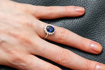 Blue sapphire ring on hand