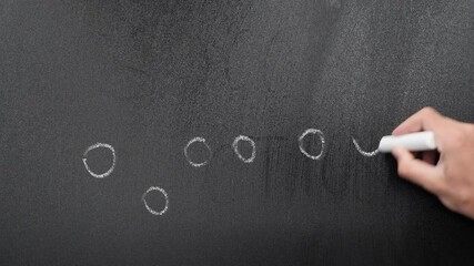 Coach using chalkboard for football match tactics. Game plan strategy on chalkboard - Powered by Adobe