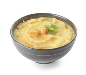 Bowl of tasty mashed potatoes with garlic on white background