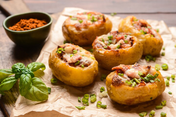 Tasty baked potato on table