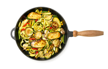 Frying pan with different vegetables on white background