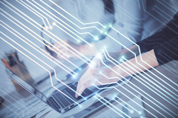 Double exposure of woman hands working on computer and data theme hologram drawing. Tech concept.