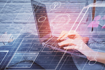 Double exposure of woman hands working on computer and data theme hologram drawing. Tech concept.