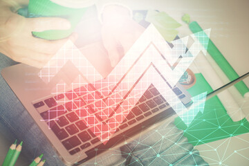 Double exposure of woman hands typing on computer and arrows drawing. Success concept.