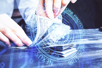 Double exposure of technology drawing hologram and us dollars bills and man hands. Data concept