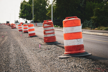 Road work construction and repair on street with safety cones