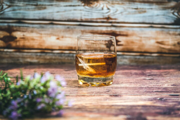whiskey glass on stone