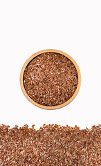 Linum usitatissimum - Organic flax seeds in the wooden bowl