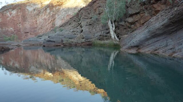 sunset view of pool in hamersley gorge at karijini national park in western australia