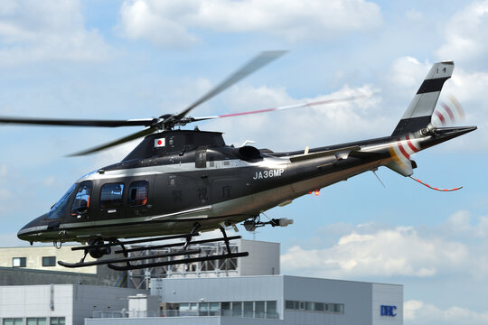 Tokyo, Japan - August 11, 2021:Tokyo Metropolitan Police Department Leonardo AW109 Trekker (JA36MP) utility helicopter.