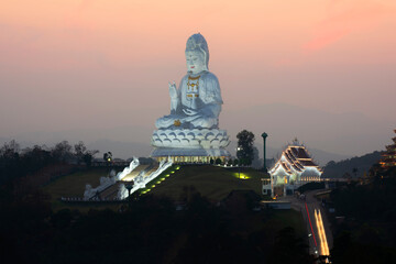 Wat Huay Pla Kung or Big Buddha Temple in Chiang Rai province in North of Thailand, During sunset at dusk, The temple