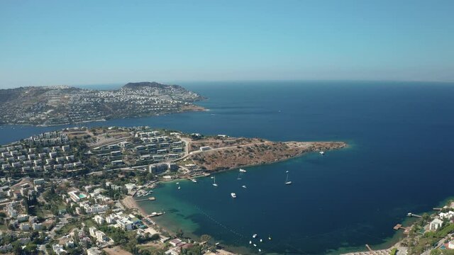 Amazing panoramic aerial 4k view from drone of beautiful bay of G�ndo_an and Yal�kavak in Bodrum on a bright and sunny day in Mugla province in Turkey