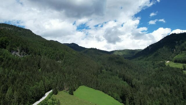 Amazing scenery and typical landscape in Austria - the Austrian Alps from above - travel photography by drone