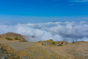 Mountain ridge in the clouds