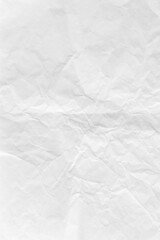 Crumpled white paper textured background