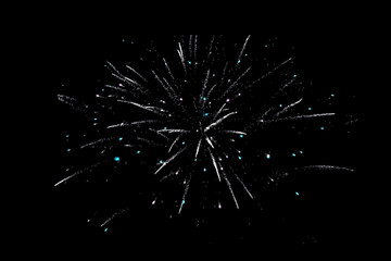 Fototapeta premium Colorful fireworks black night sky background isolated close up, red, blue, golden firecracker pattern, salute backdrop, holiday banner, celebration border, festive texture, design element, copy space
