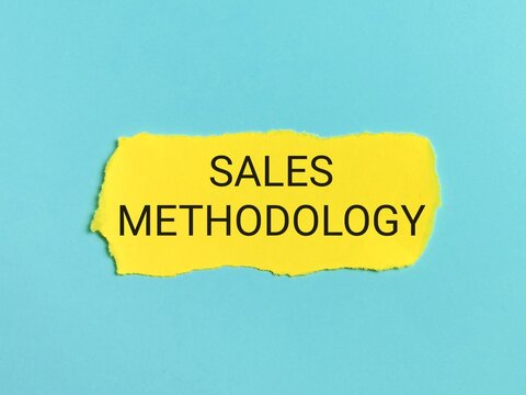 Sales Methodology Written On Yellow Paper Strip Isolated On Bluish Background.