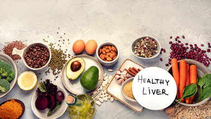 Fototapeta na wymiar Best sources for liver health on light gray background.