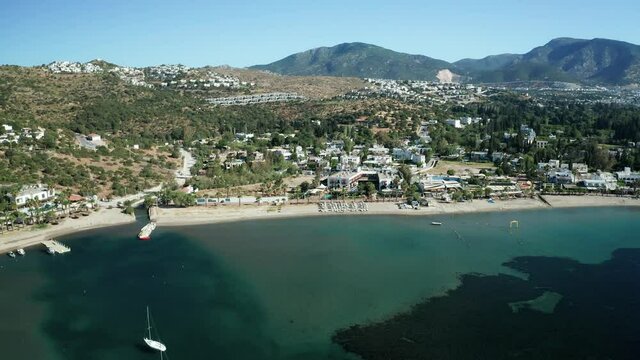 Amazing panoramic aerial 4k view from drone of beautiful bay of Bitez and Bodrum city in Bodrum on a bright and sunny day in Mugla province in Turkey