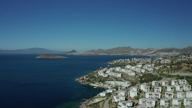 Amazing panoramic aerial 4k view from drone of beautiful bay of Bitez and Bodrum city in Bodrum on a bright and sunny day in Mugla province in Turkey
