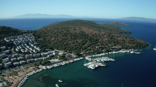 Amazing panoramic aerial 4k view from drone of beautiful bay of Bitez and Bodrum city in Bodrum on a bright and sunny day in Mugla province in Turkey