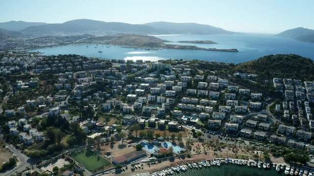 Amazing panoramic aerial 4k view from drone of beautiful bay of Bitez and Bodrum city in Bodrum on a bright and sunny day in Mugla province in Turkey