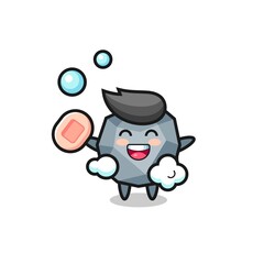 stone character is bathing while holding soap