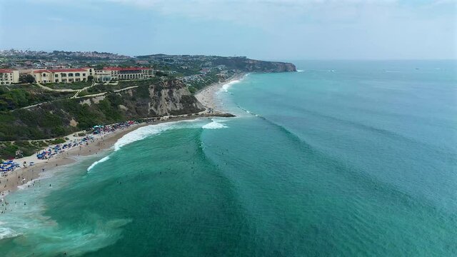 Aerial view of waves rolling into Salt Creek Beach, below the Ritz Carlton, in Dana Point, California