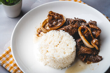 Bistek Tagalog( Filipino Beef Steak) is made of thinly sliced sirloin braised in a mixture of citrus, soy sauce, onions, and garlic.

