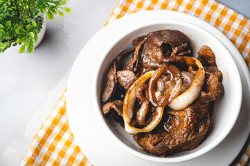 Bistek Tagalog( Filipino Beef Steak) is made of thinly sliced sirloin braised in a mixture of citrus, soy sauce, onions, and garlic.

