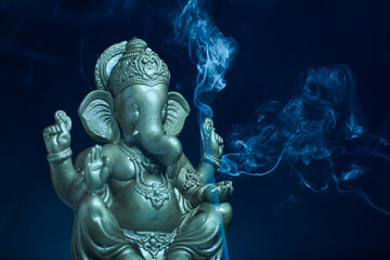 lord ganesha sclupture over dark background. celebrate lord ganesha festival.