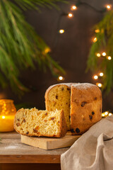 Traditional Italian Christmas cake Panettone with festive decorations 