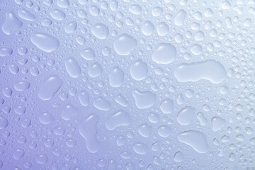 水滴のついたガラスの背景テクスチャー