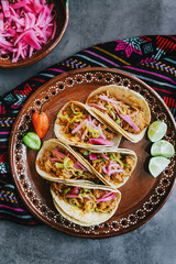 mexican cochinita pibil tacos with habanero sauce traditional food in Yucatan Mexico - obrazy, fototapety, plakaty
